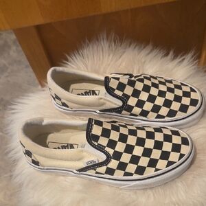 Vans Checkerboard Slip-On Sneakers in Black and White